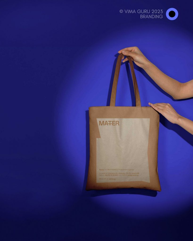 Canvas tote bag with the Matter Development logo, on deep blue