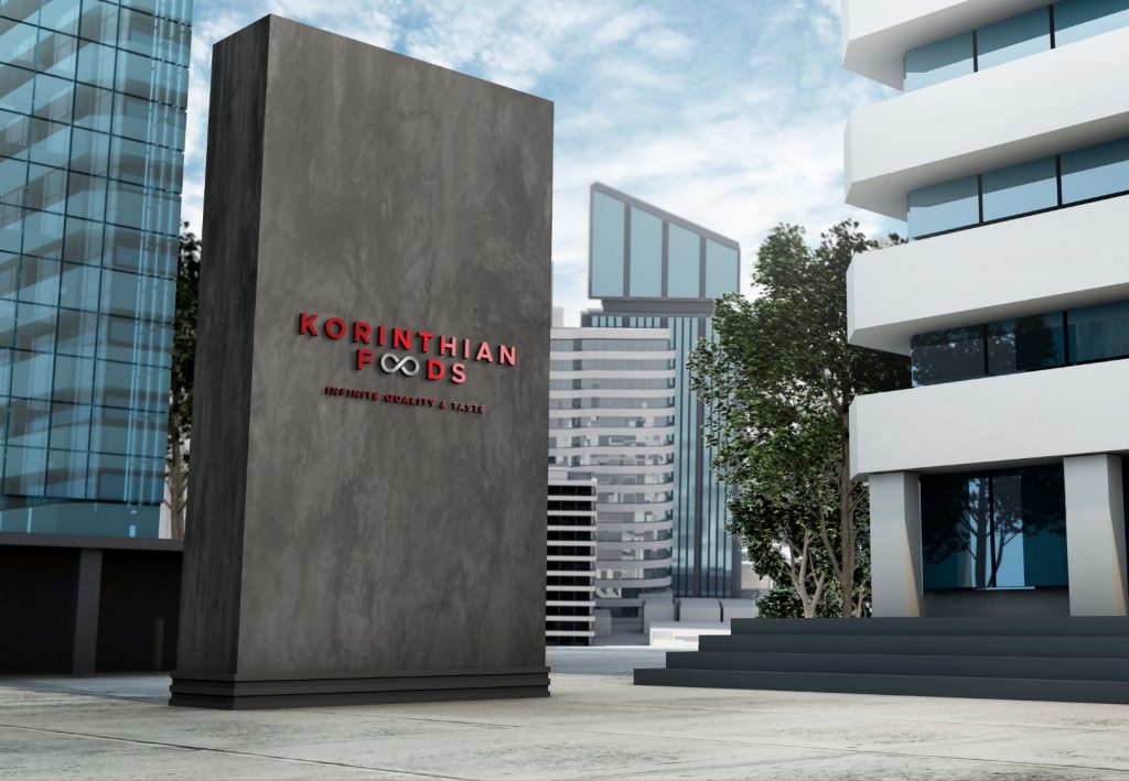 Το λογότυπο της Korinthian Foods με το σύνθημα ‘Infinite Quality & Taste’, στην πρόσοψη του κτιρίου της εταιρείας
