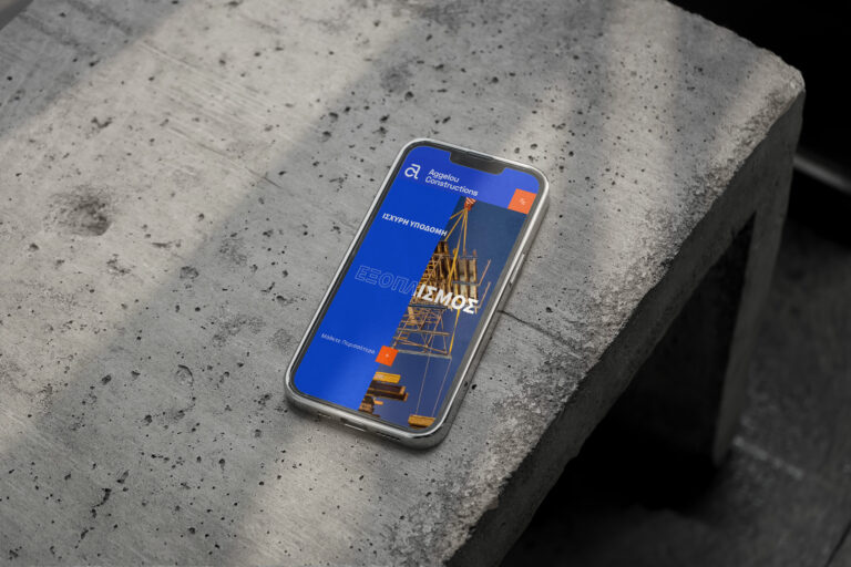 Aggelou Constructions website on a mobile phone